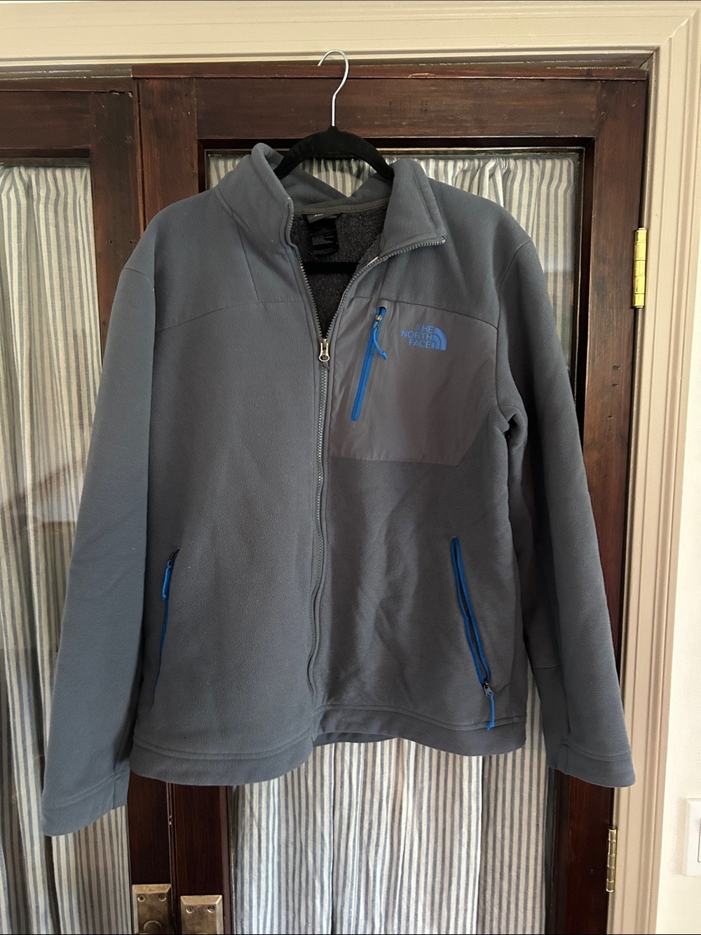 The North Face Grey Fleece Jacket with Blue Zipper Accents